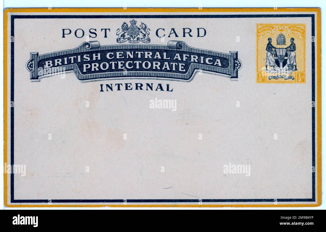 The Protectorate was established in 1889. The card is black and yellow printing on buff board with a printed half-penny stamp of two native figures. Stock Photo