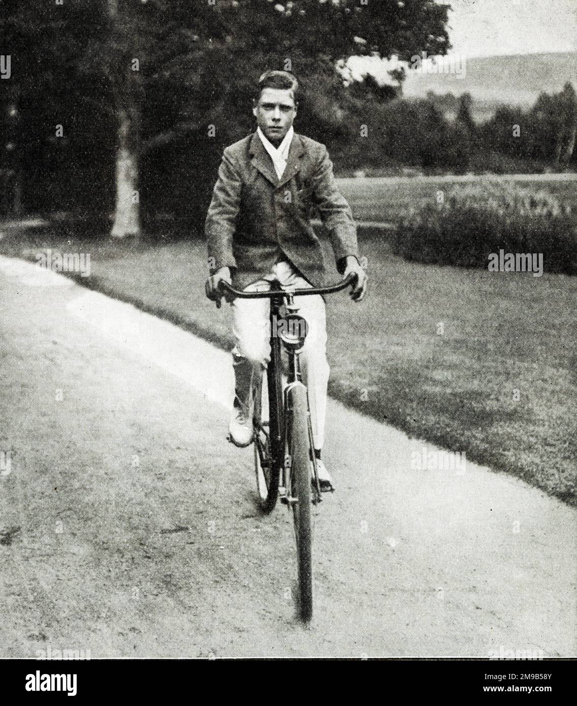 The Prince of Wales (later King Edward VIII), taking an early morning cycle ride Stock Photo