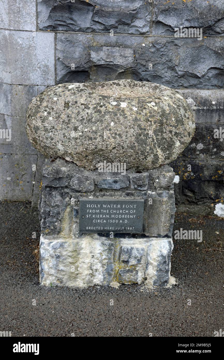 Holy water font relocated from Modreeny to the Catholic Church of Saint Michael and Saint John at Cloughjordan in County Tipperary Stock Photo