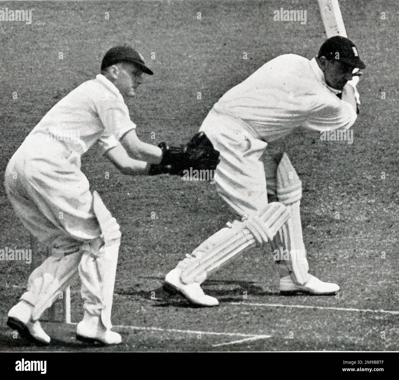 England cricketer Wally Hammond hitting a boundary off McCabe at Lords, 1938, B A Barnett keeping wicket Stock Photo