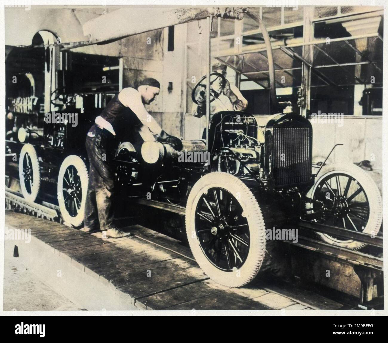 Working on the Ford assembly line in Detroit, USA, 1913. Stock Photo