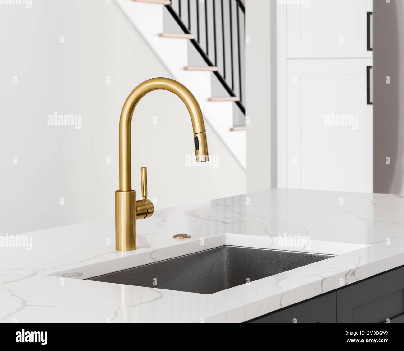 Beautiful Modern Kitchen Design Kitchen Faucet And Kitchen Décor Gray  Marble Kitchen Island Stock Photo - Download Image Now - iStock