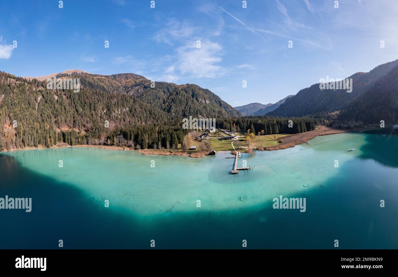 Lake Weissensee in Carinthia. Panorama aerial view of the East side of the idyllic lake during autumn. Stock Photo