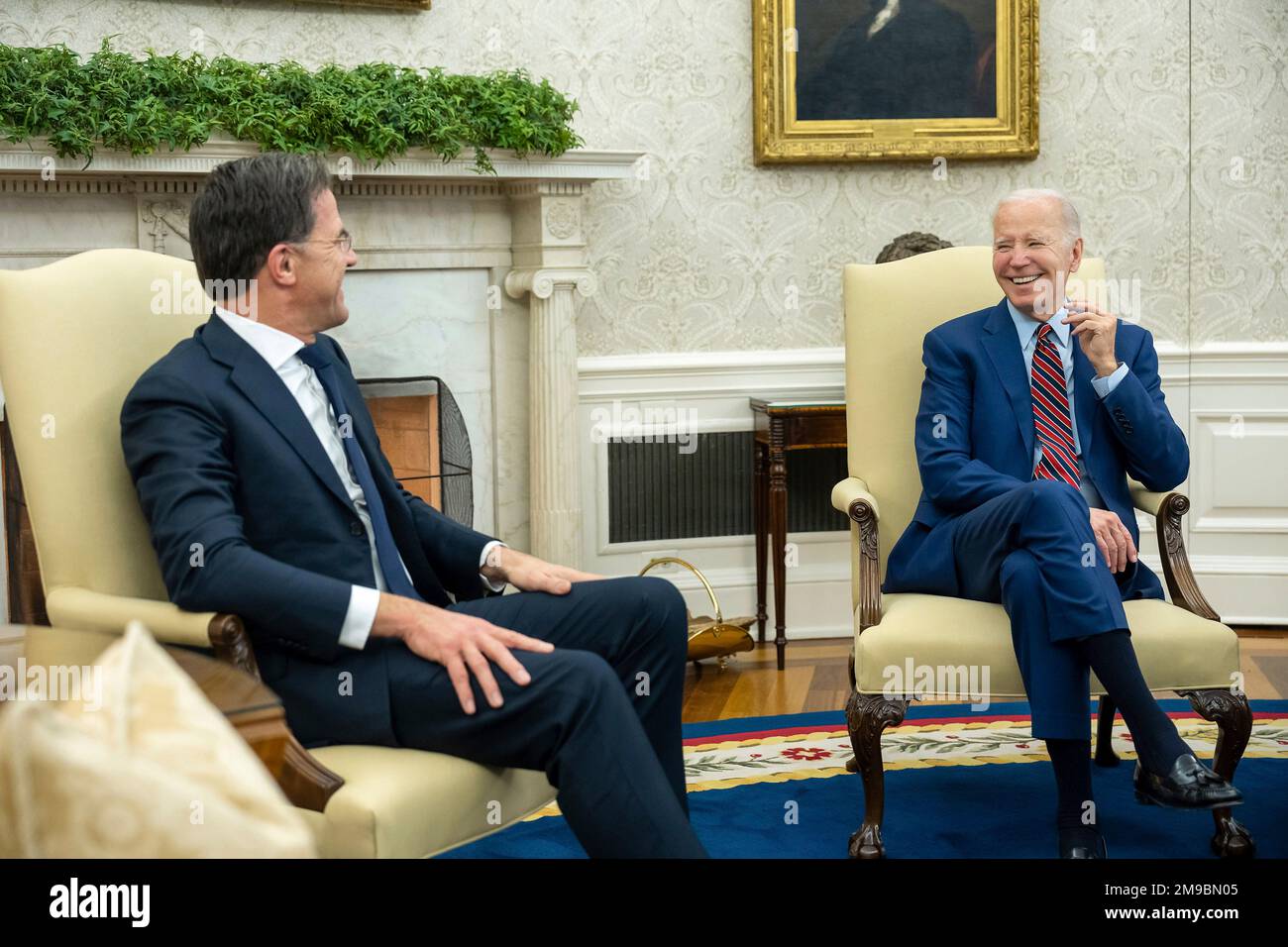 Washington, United States Of America. 17th Jan, 2023. Washington, United States of America. 17 January, 2023. U.S President Joe Biden shares a laugh with Dutch Prime Minister Mark Rutte, left, before the start of their bilateral meeting in the Oval Office of the White House, January 17, 2023 in Washington, DC Credit: Adam Schultz/White House Photo/Alamy Live News Stock Photo
