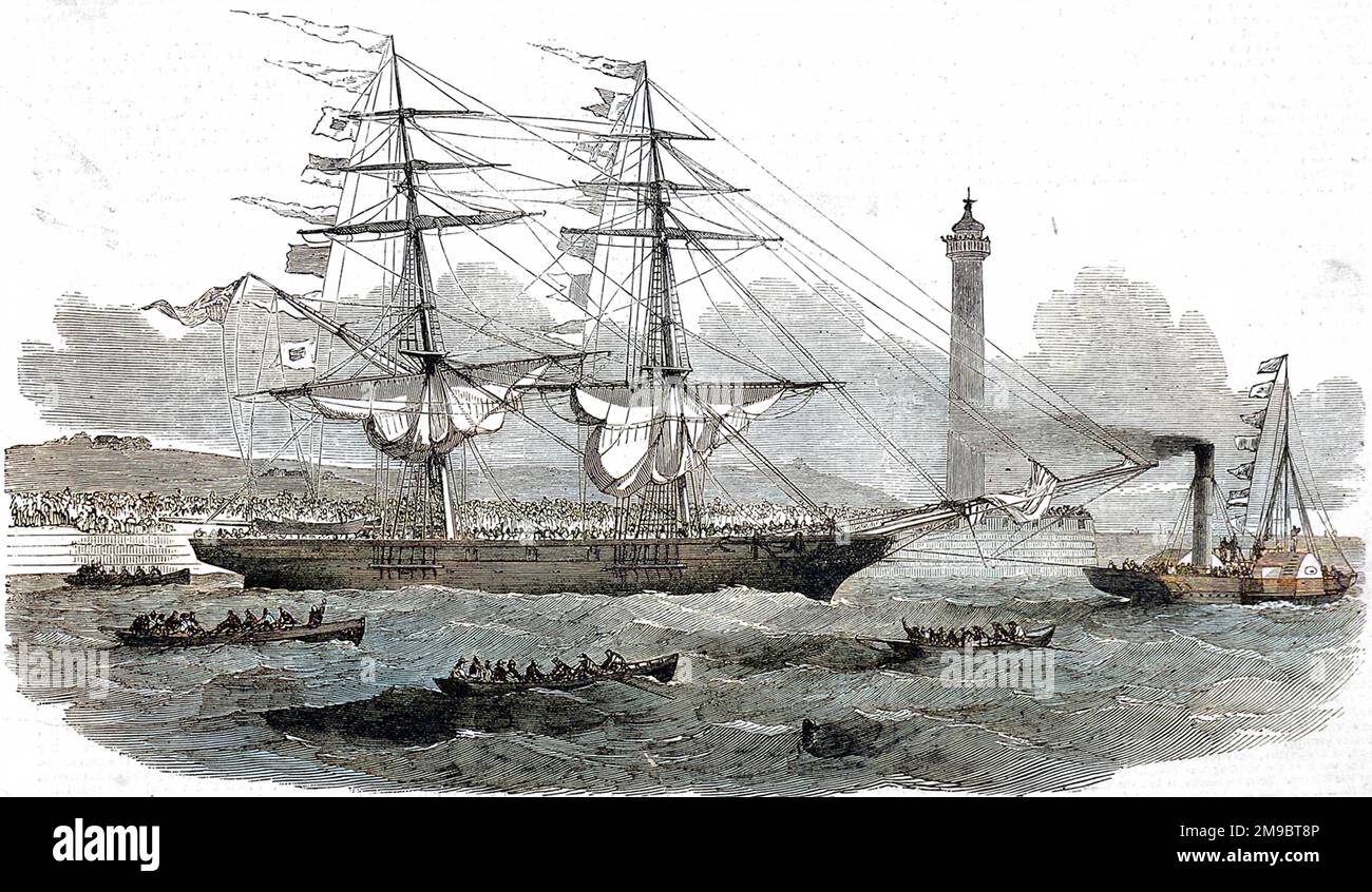 The two-masted emigrant ship, 'Lizzie Webber', leaving Sunderland for Australia. This was the first emigrant ship to make that passage.   The image shows small boats and a steam tug sailing in the foreground and, on the shore, hundreds of people bidding farewell. Stock Photo