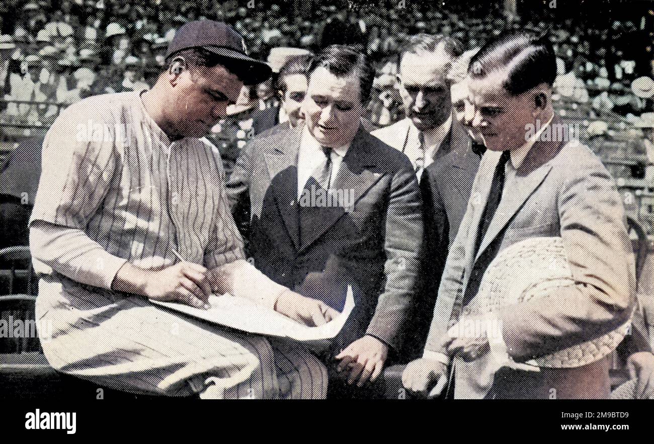 Babe Ruth (1895 - 1948), American baseball player, signing a $100,000 contract for a twelve-week tour. Stock Photo