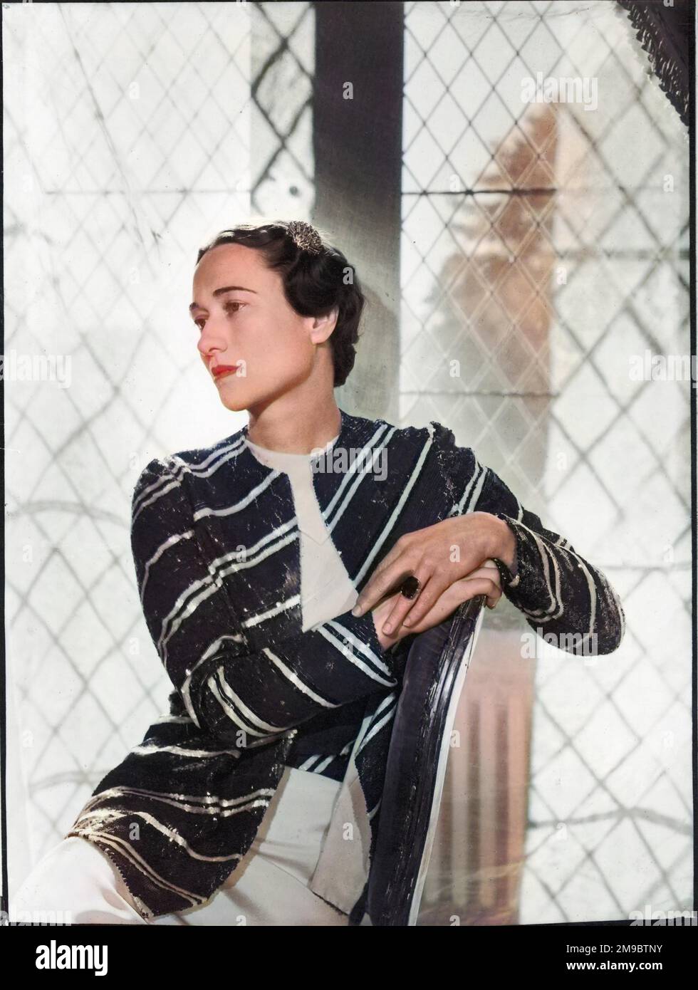 A glamorous studio portrait of Bessie Wallis Warfield Simpson, later Duchess of Windsor (1896-1986), American socialite. Born in Blue Ridge Summit, Pennsylvania, she divorced her second husband, Ernest Simpson in order to marry Edward VIII who abdicated the throne in December 1936 to marry her. Stock Photo
