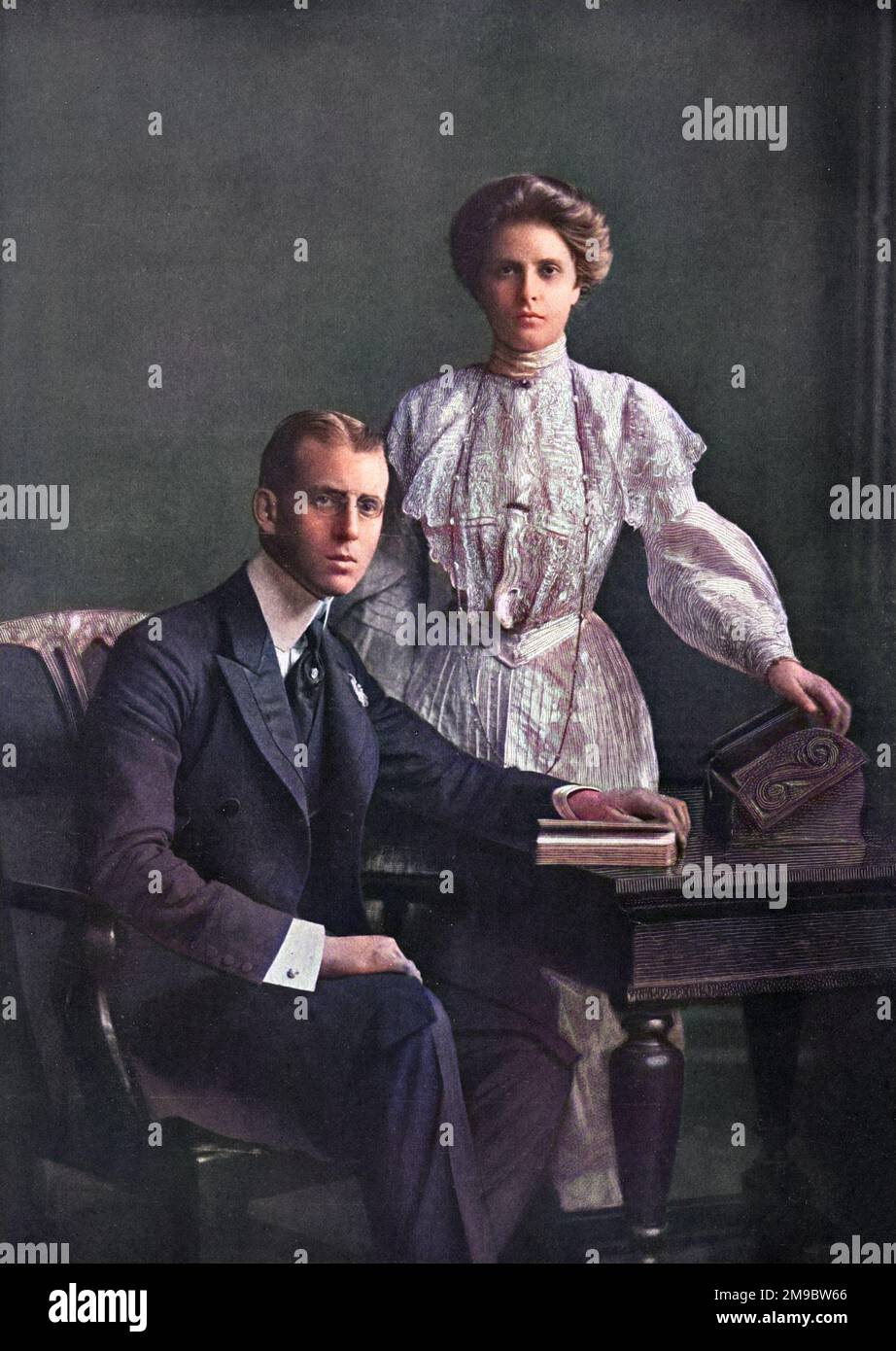 Prince Andrew of Greece (1882 - 1944), fourth son of King George I of Greece (and a nephew of Queen Alexandra) together with his fiancee, Princess Alice of Battenberg (1885  - 1969), eldest child of Princess Victoria of Hesse and Prince Louis of Battenberg.  Pictured shortly before their marriage in 1903.  They are the parents of Prince Philip, Duke of Edinburgh. Stock Photo