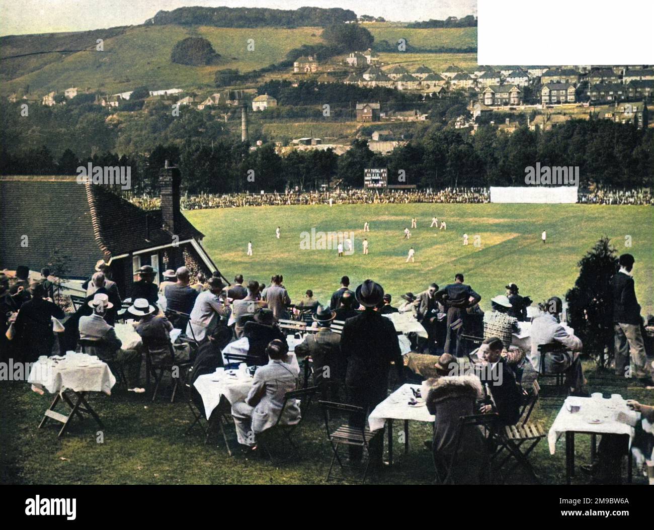 The lovely Crabble cricket ground at Dover, Kent, which was used by Kent County Cricket Club from 1907 to 1976. The match in progress is between Kent and Yorkshire, which was won easily by the visitors who went on to win the County Championship that season. Stock Photo