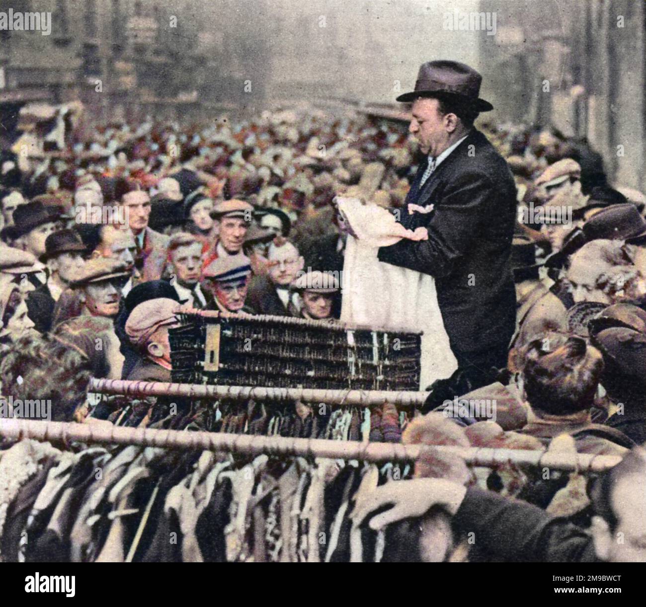A market trader at Petticoat Lane on a Sunday morning, extolling the ...