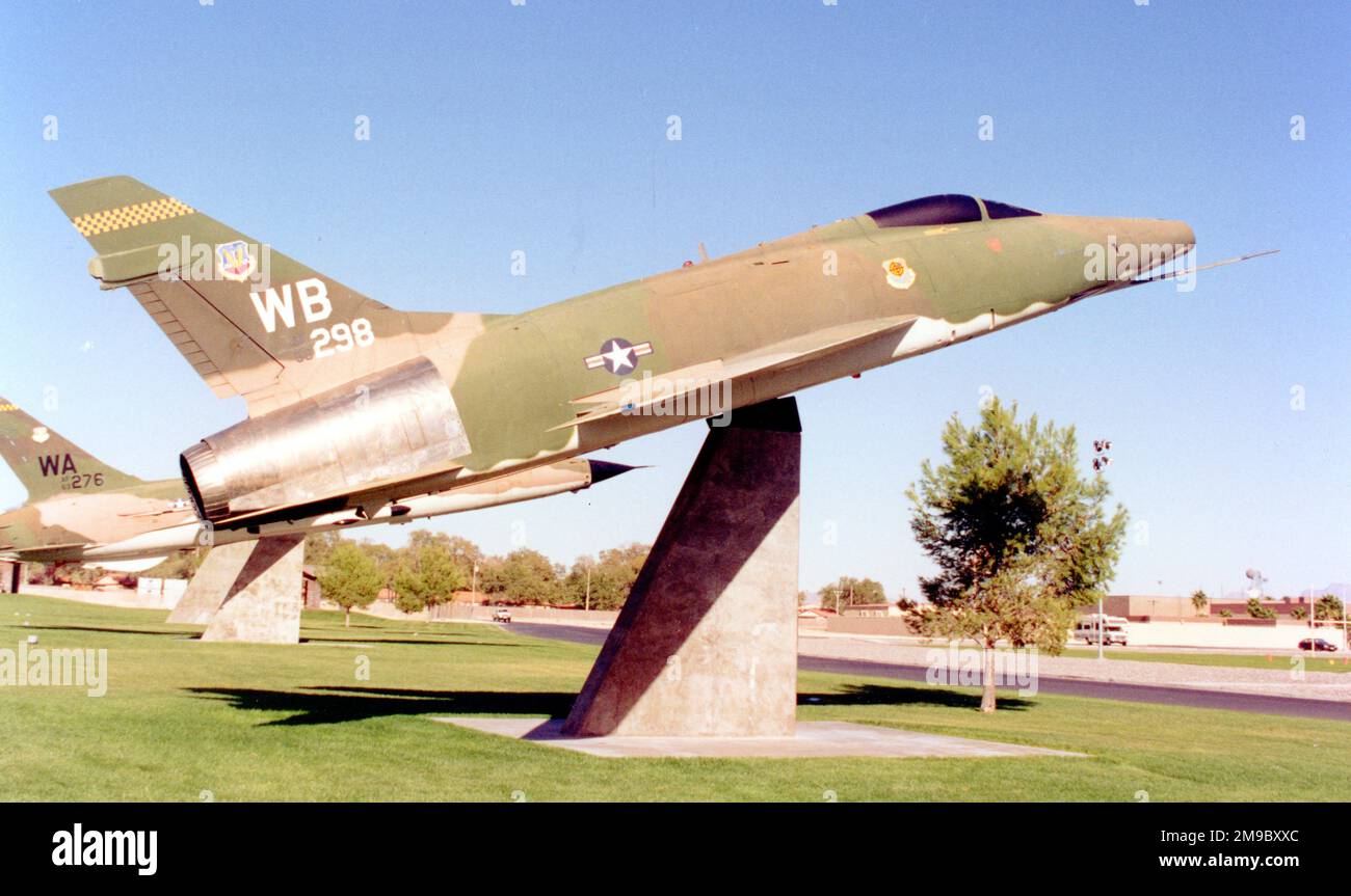 North American F-100D Super Sabre 55-3595 (MSN 223-277), mounted on a pylon at Freedom Park, Nellis AFB, Nevada, with F-5E 74-1571, F-105F 63-8276 and F-111A 67-0100. Stock Photo