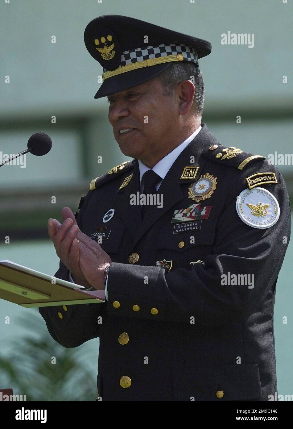 General David Cordova Campos applauds after taking office as Commander