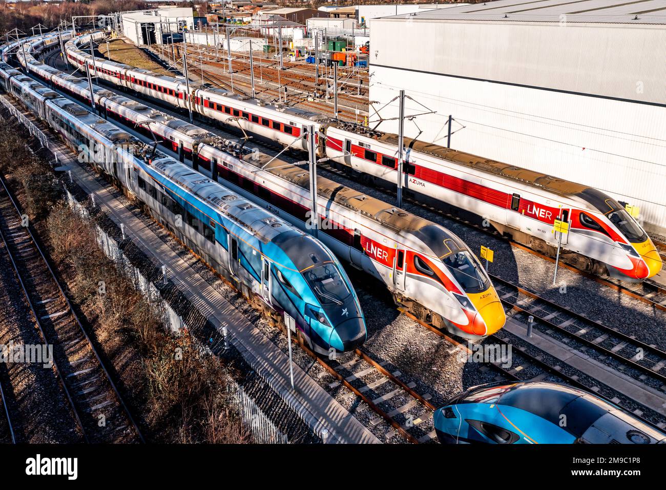 Aerial view of unused passenger trains stabled in sidings from LNER and