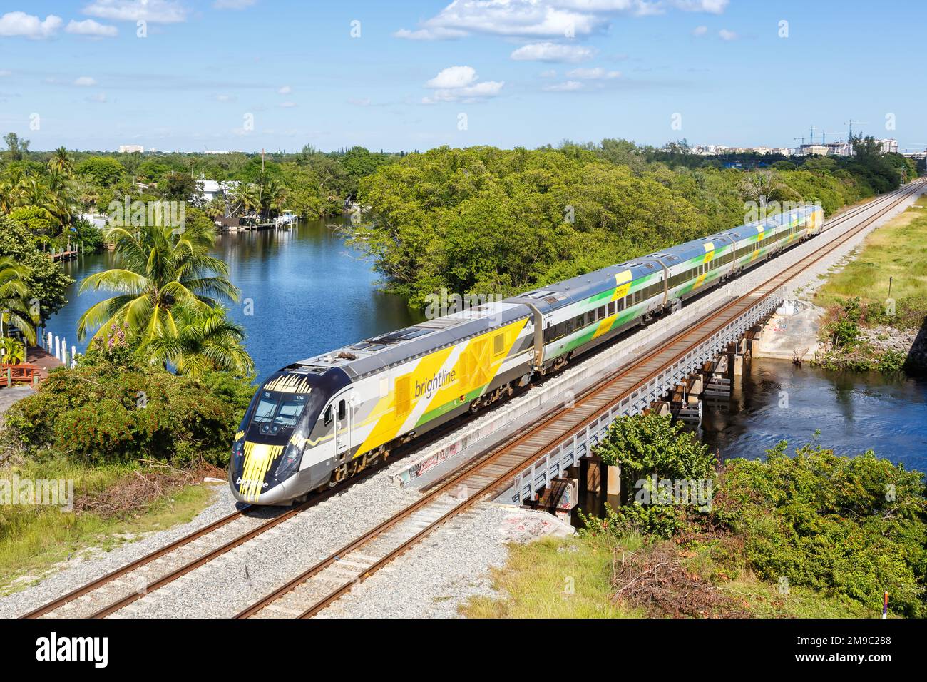 Deerfield Beach, United States - November 13, 2022: Brightline private inter-city rail train in Deerfield Beach in Florida, United States. Stock Photo