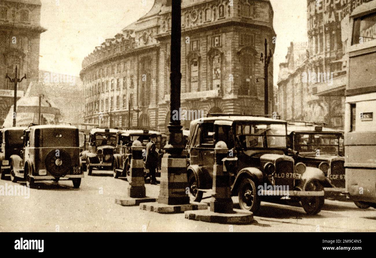 Taxis at Piccadilly Circus, London Stock Photo