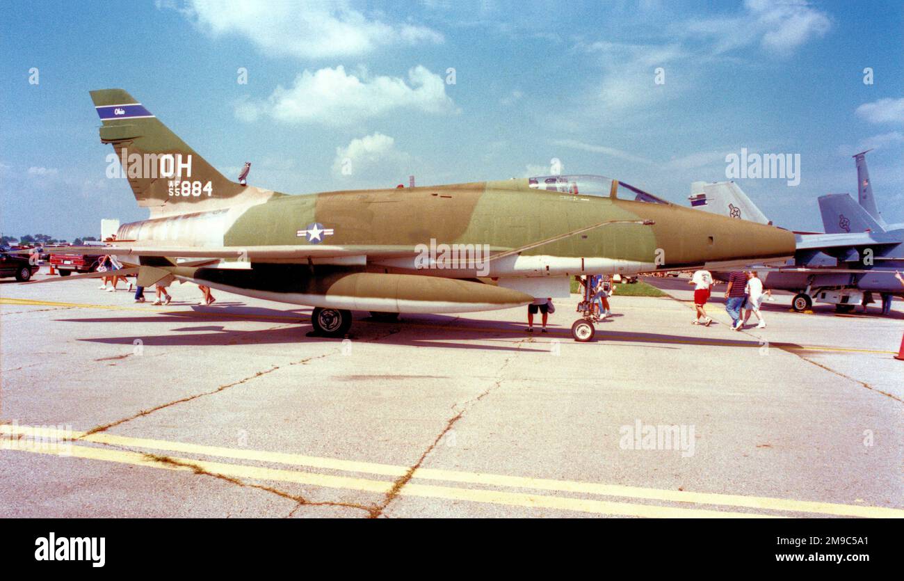 North American F-100D-50-NH Super Sabre 55-2884 (MSN 224-151) on display at Rickenbacker ANGB, Columbus, Ohio. With decoy Owl perched on the fin to deter birds leaving presents behind.. Stock Photo