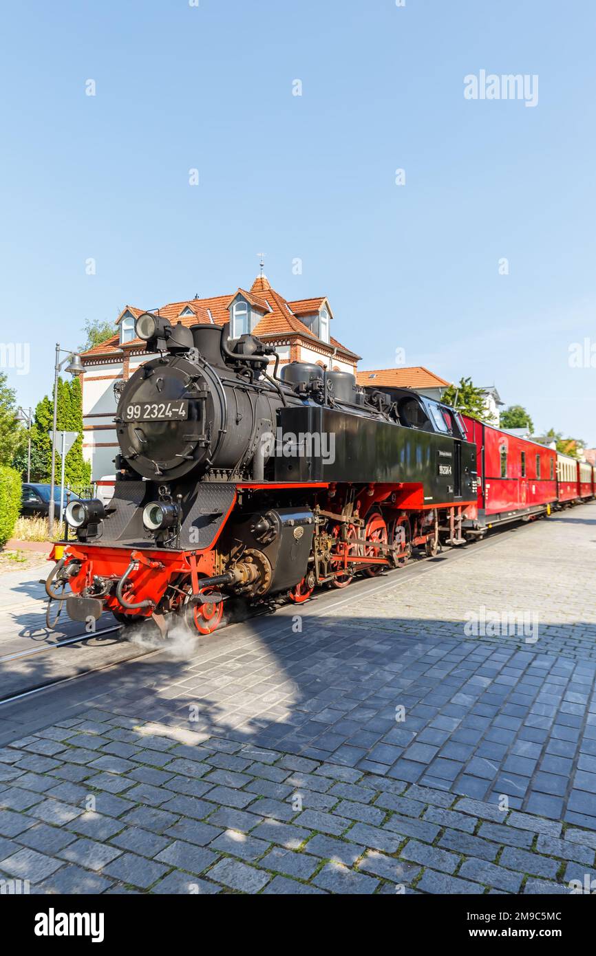 Baederbahn Molli steam train locomotive railway portrait format rail in Bad Doberan, Germany Stock Photo