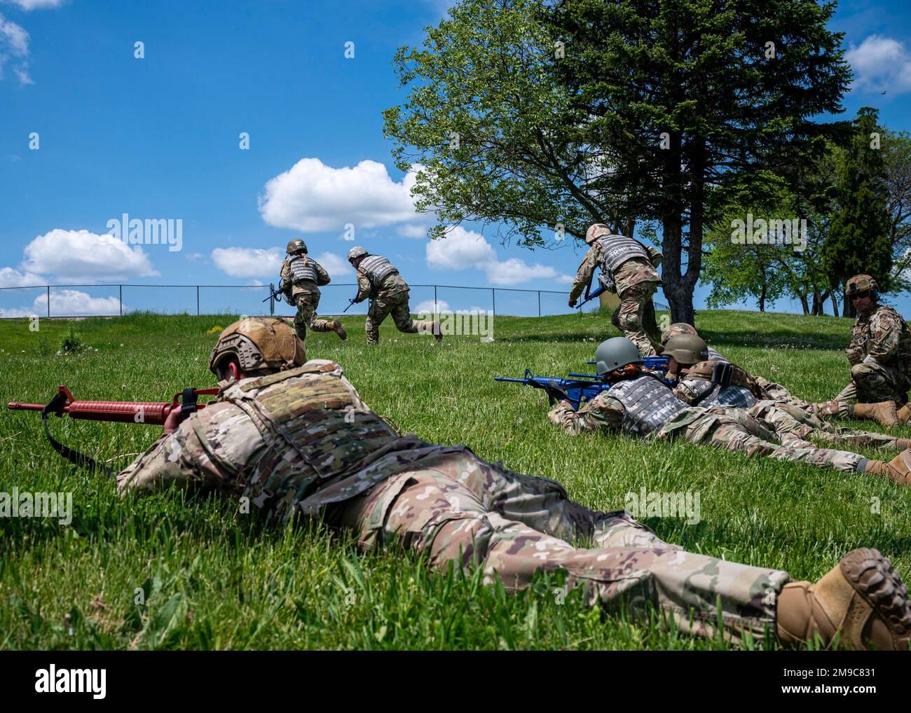 Airmen from the 171st Air Refueling Wing and the 911th Airlift Wing take part in a Combat Lifesaver Course, May 15, 2022, near Pittsburgh, Pennsylvania. The students were run through a series of realistic trauma scenarios using tactical maneuvers to approach casualties then provide frontline life-saving medical treatment. Stock Photo