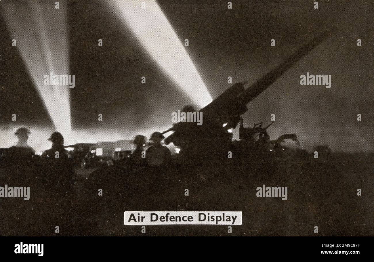 Air Defence Display at the Aldershot Military Tattoo, an annual event dating back to 1894. In the 1920s and 1930s, the Aldershot Command Searchlight Tattoo held at the Rushmoor Arena presented displays from all branches of the services, including performances lit by flame torches. At one time the performances attracted crowds of up to 500,000 people. Stock Photo