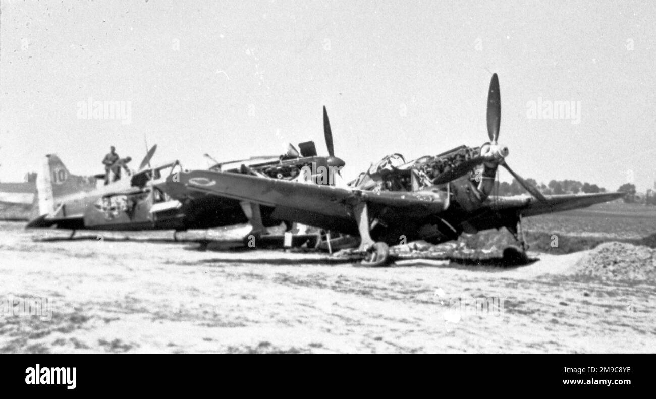 A pair of damaged Morane-Saulnier MS.406 C.1 fighters, abandoned on a French airfield. Stock Photo
