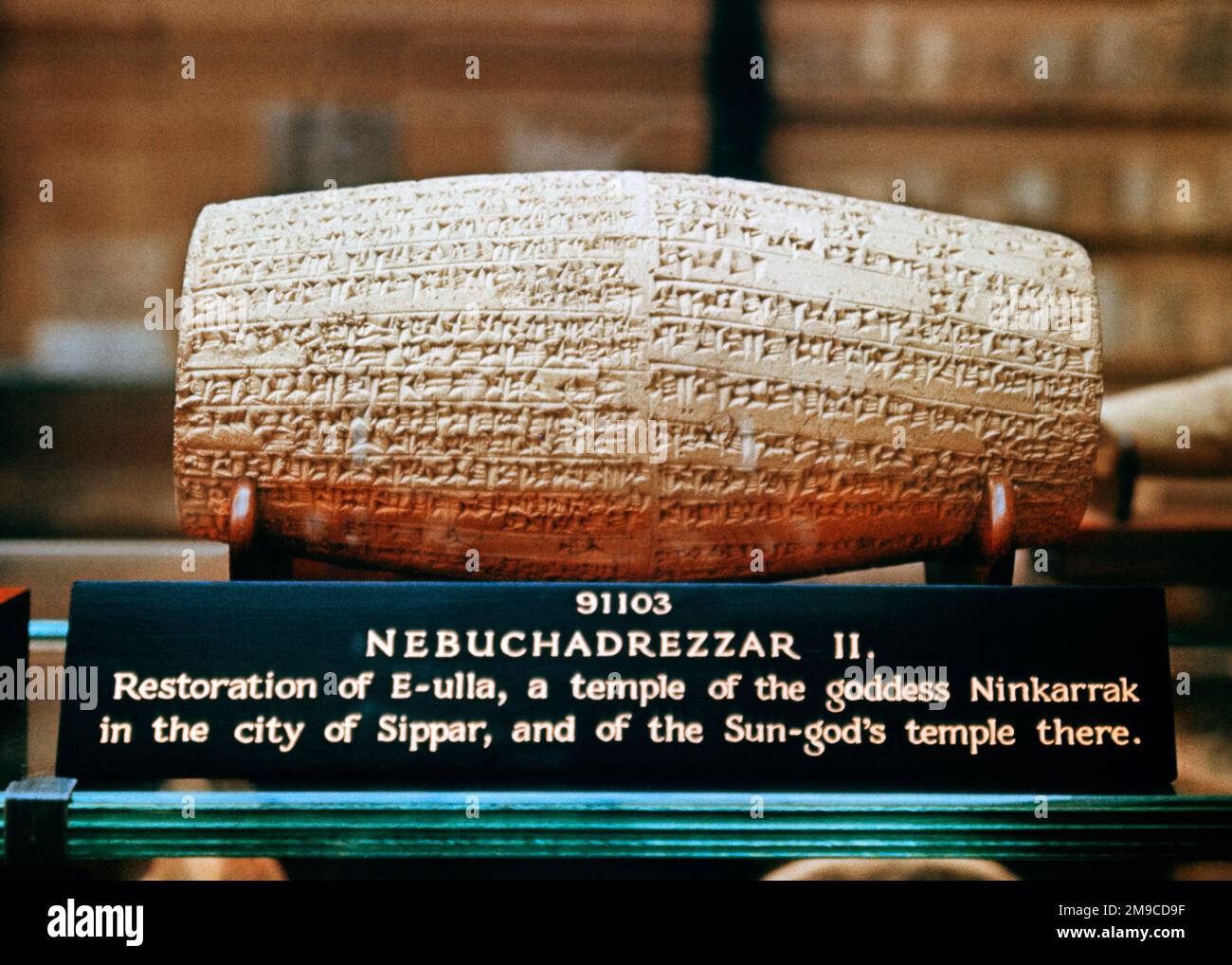 1960s CUNEIFORM CYLINDER OF NEBUCHADREZZAR II FOUND IN ARCHEOLOGICAL EXCAVATIONS IN SIPPAR IRAQ DATED TO 600 BCE - kr17208 LAN001 HARS RELIC Stock Photo