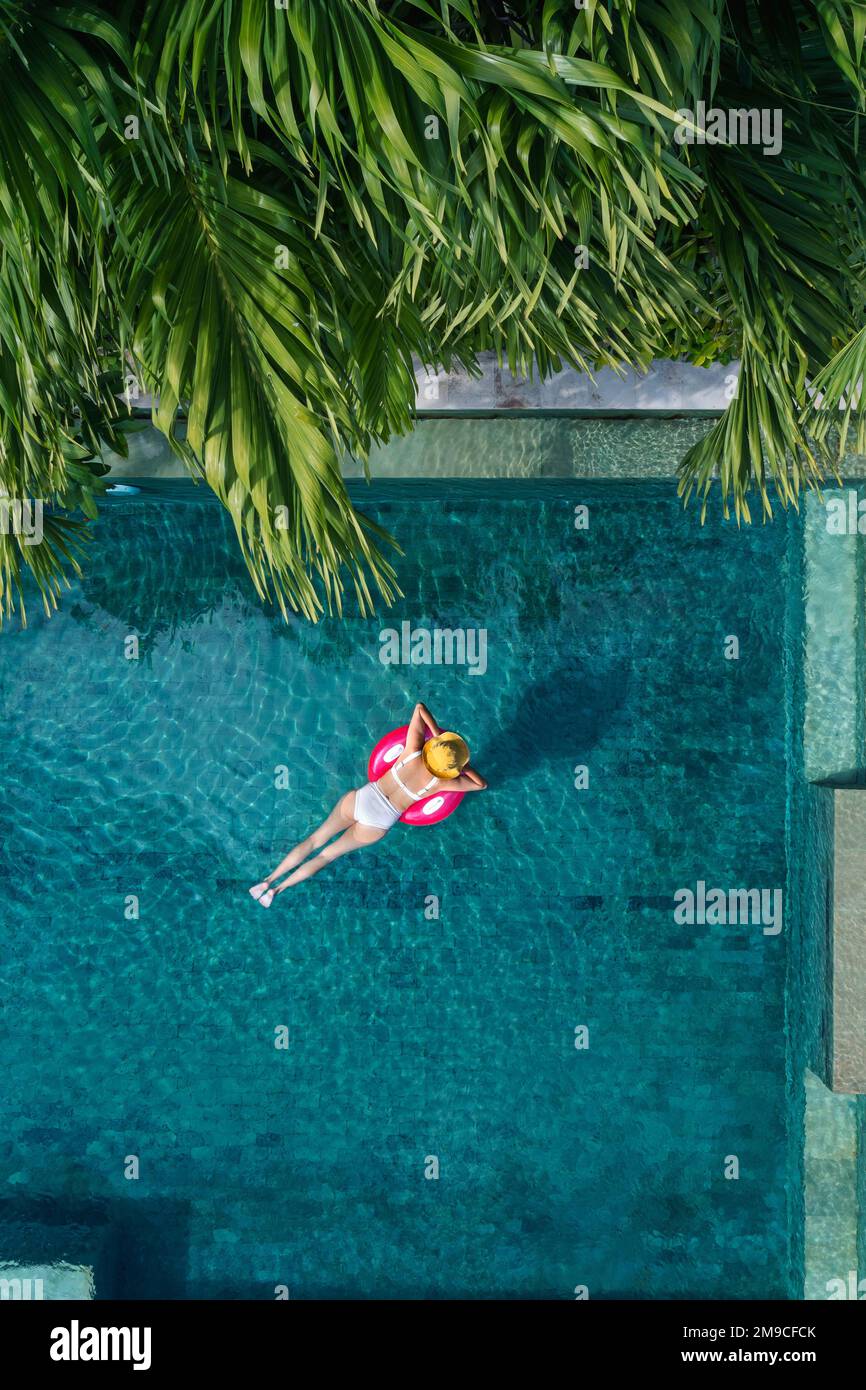 Aerial view of woman in swimming pool Stock Photo - Alamy
