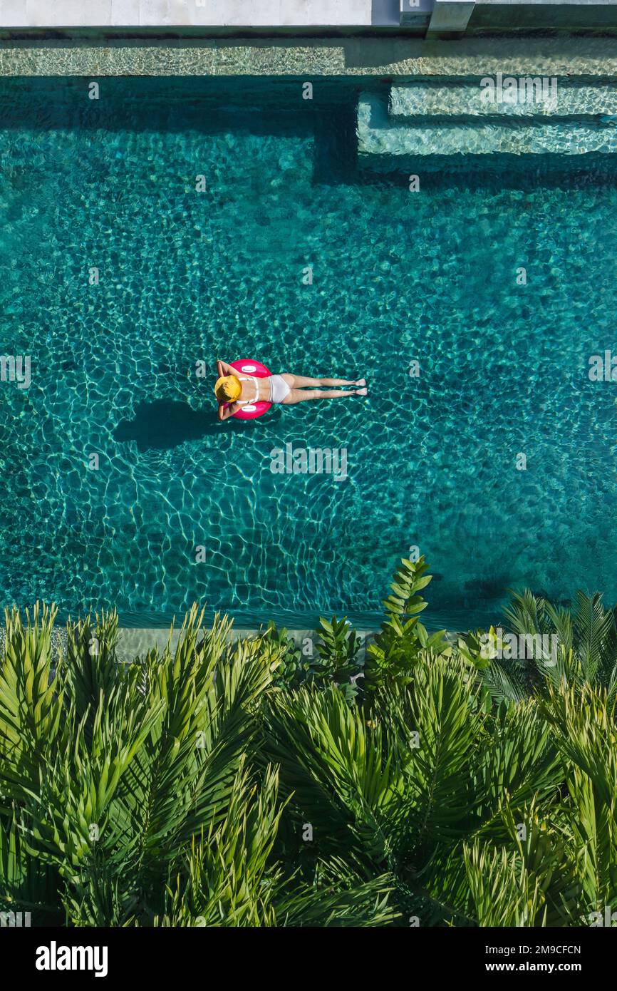 Aerial view of woman in swimming pool Stock Photo - Alamy