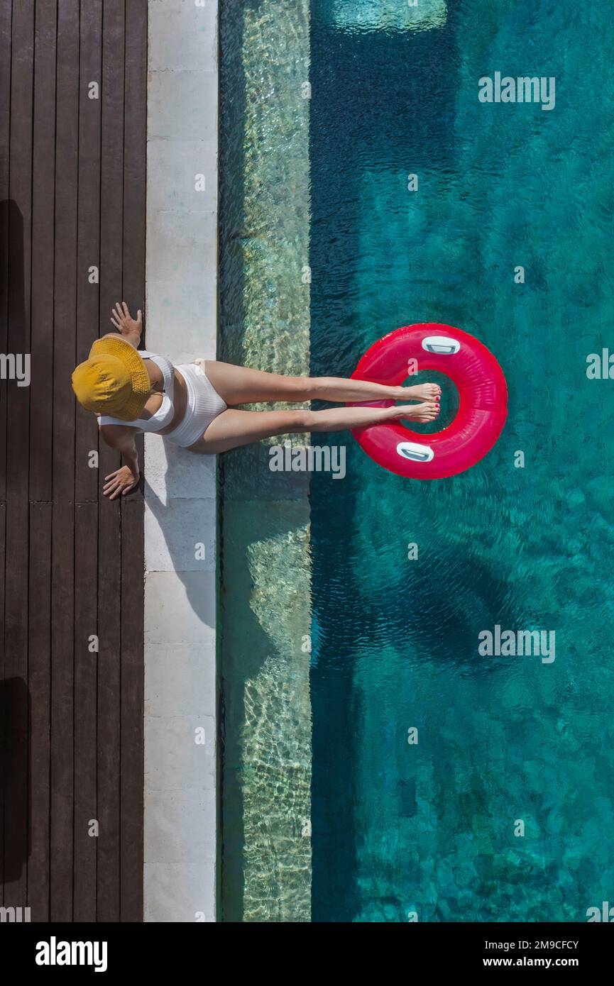 Aerial view of woman in swimming pool Stock Photo - Alamy