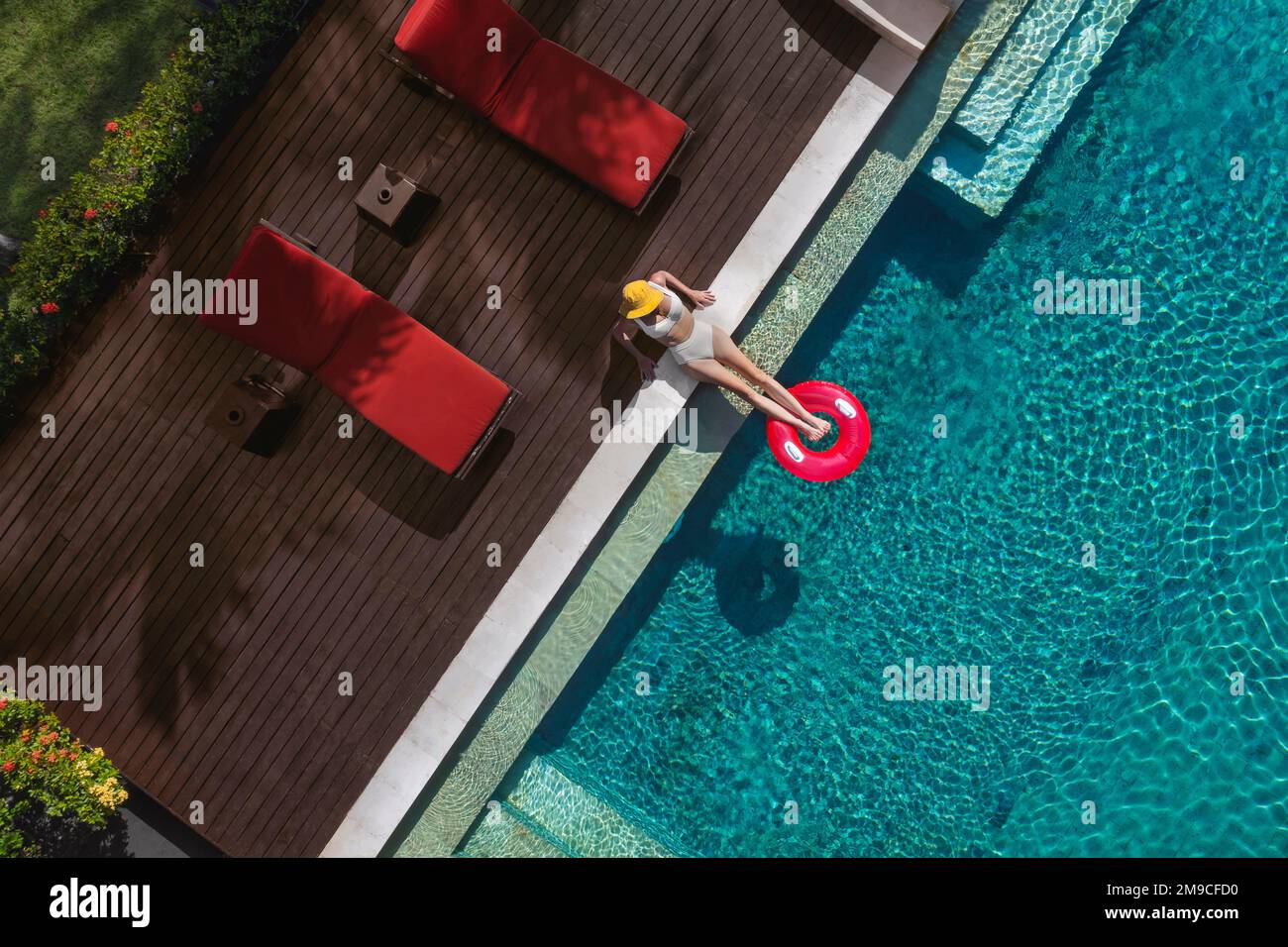Aerial view of woman in swimming pool Stock Photo - Alamy