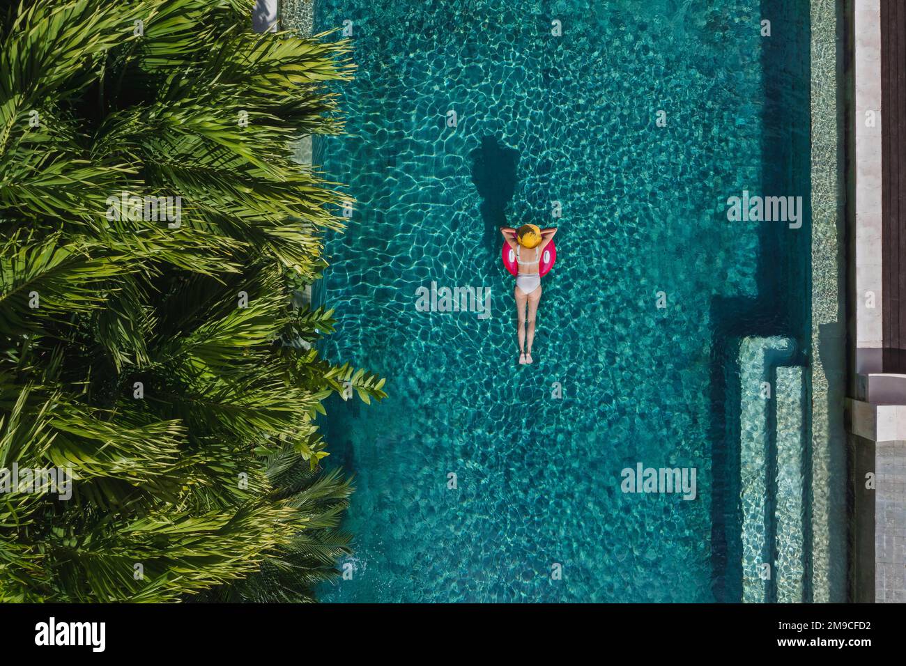 Aerial view of woman in swimming pool Stock Photo - Alamy