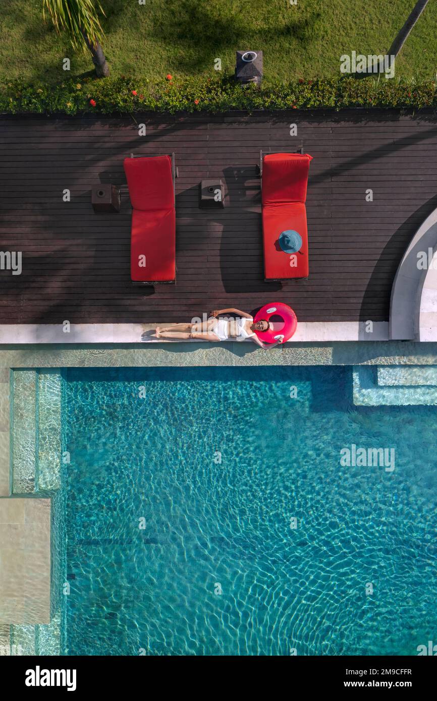 Aerial view of woman in swimming pool Stock Photo - Alamy