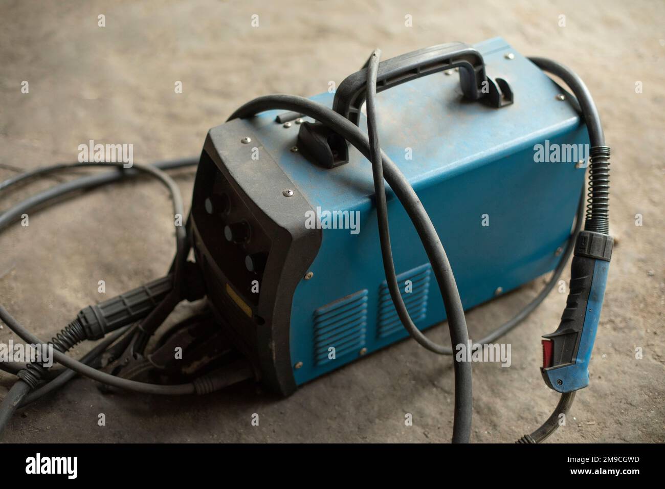 Electricity generator. Tools in garage. Battery storage. Stock Photo