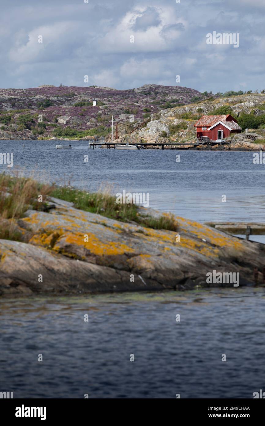 Red Swedish Fisherman House, Vastra Gotalan, Kyrkesund, Sweden Stock Photo
