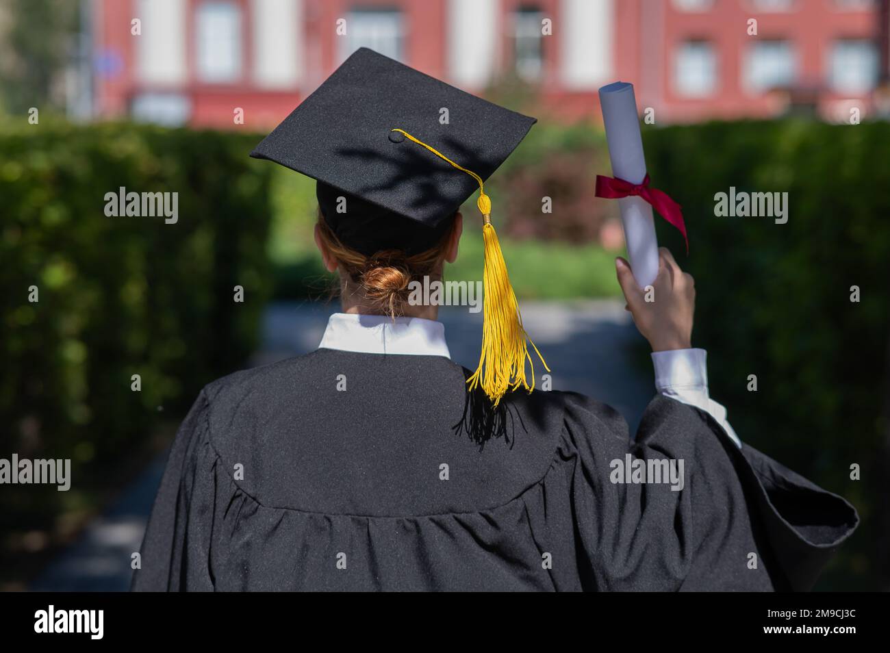 Graduation Robe Full Back View University graduation blue cap and gown hi-res stock photography and ...