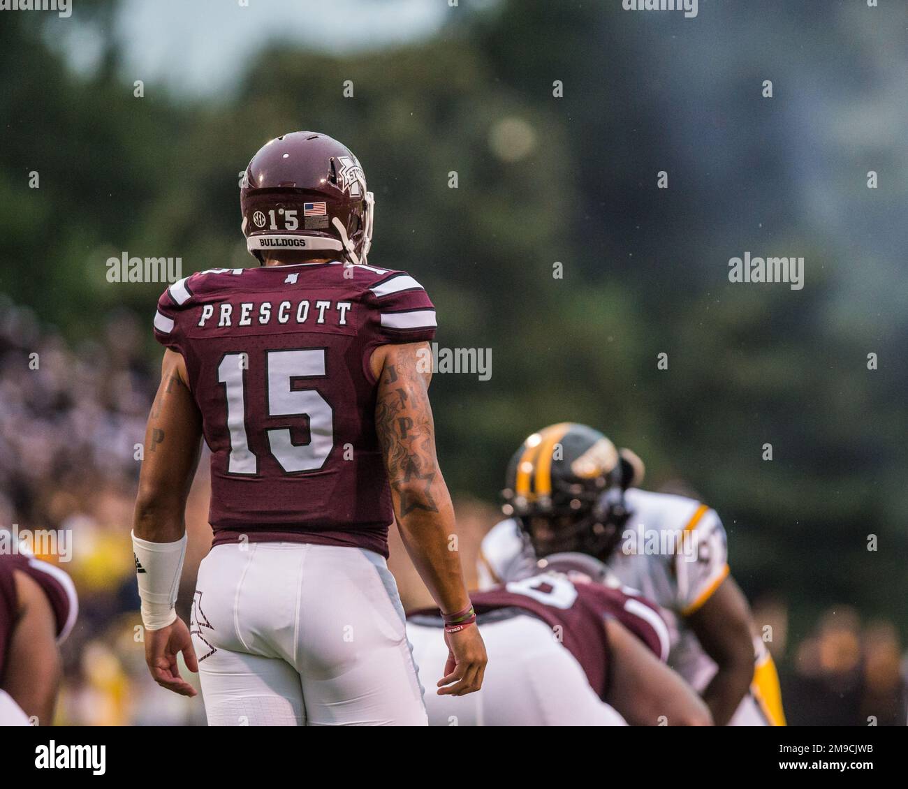 Dak Prescott  stands ready to call a  play against The University of Southern Mississippi.  University of Southern Mississippi vs. Mississippi State University - August 30, 2014, Davis Wade Stadium at Scott Field, Starkville, Mississippi. Credit: Kevin Williams/Alamy Live News. Stock Photo