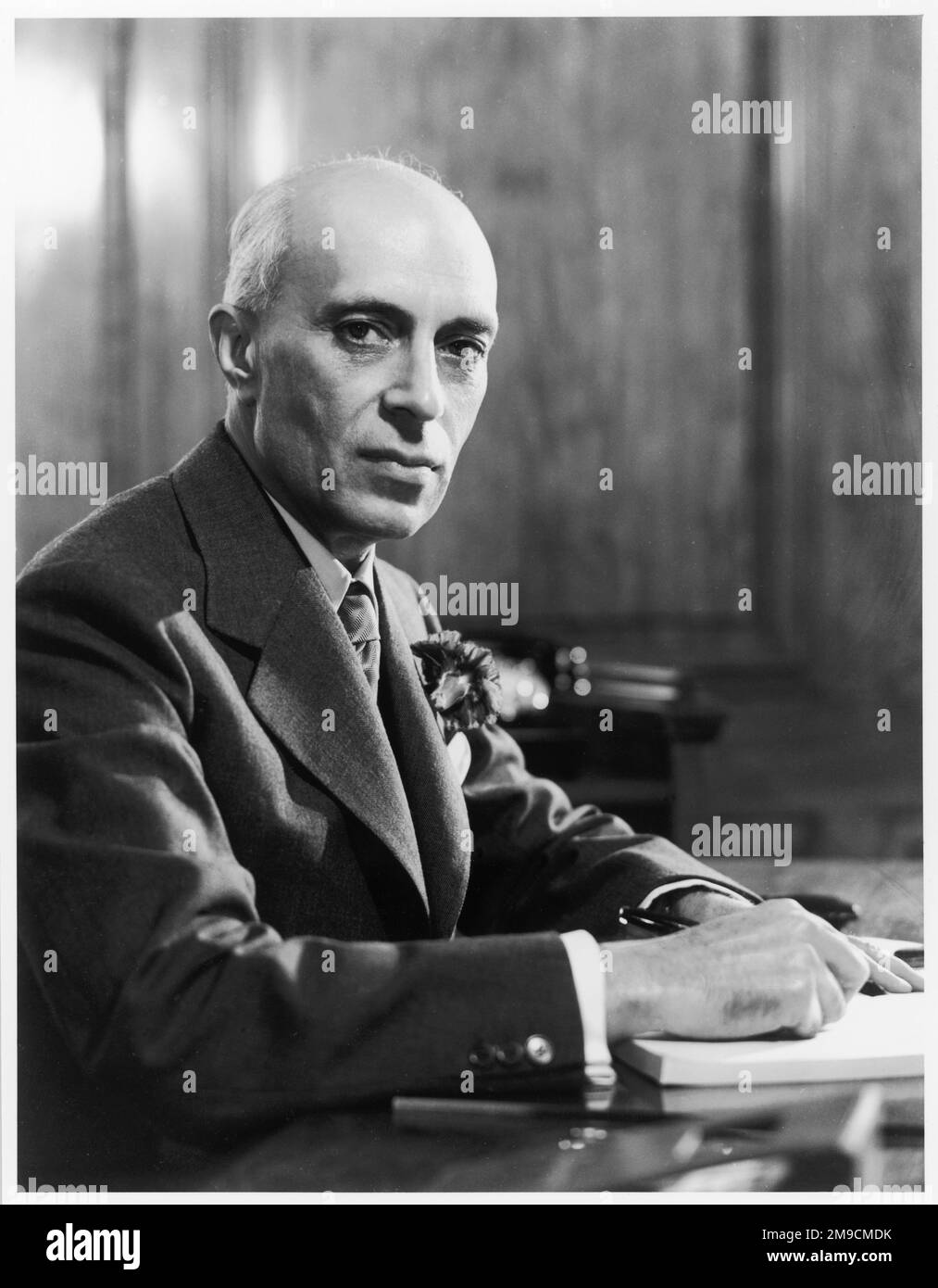 Jawaharlal (Pandit) Nehru (1889-1964), Indian political leader, seen here sitting at his desk. Stock Photo