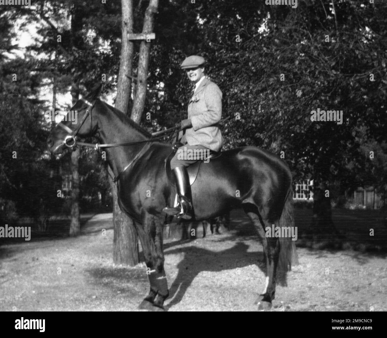 A Gentleman Riding A Black Horse Stock Photo Alamy a-gentleman-riding-a-black-horse-stock-photo-alamy