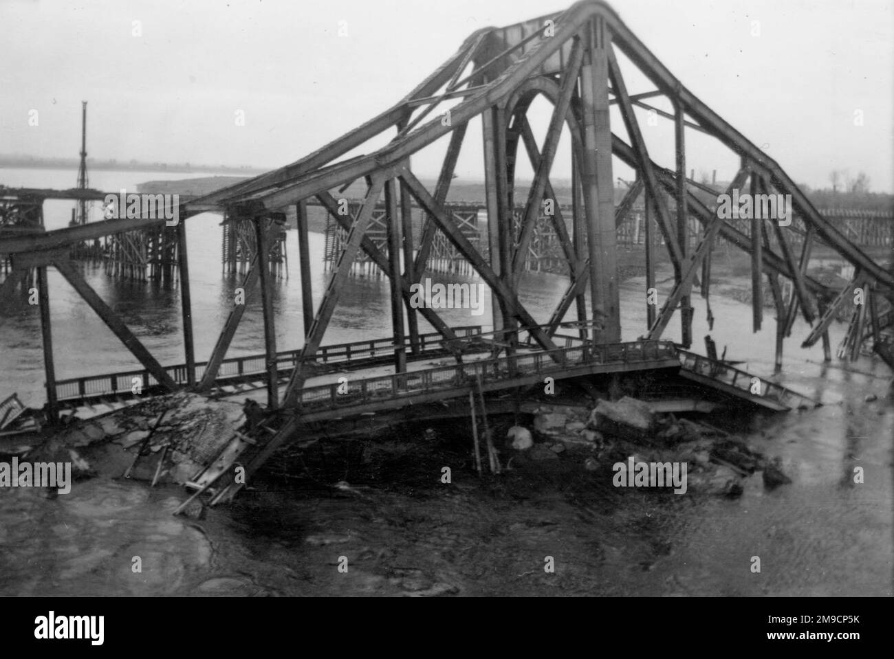 A destroyed bridge on the northern Rhine at Wesel, Germany, photographed soon after the end of the Second World War. Stock Photo