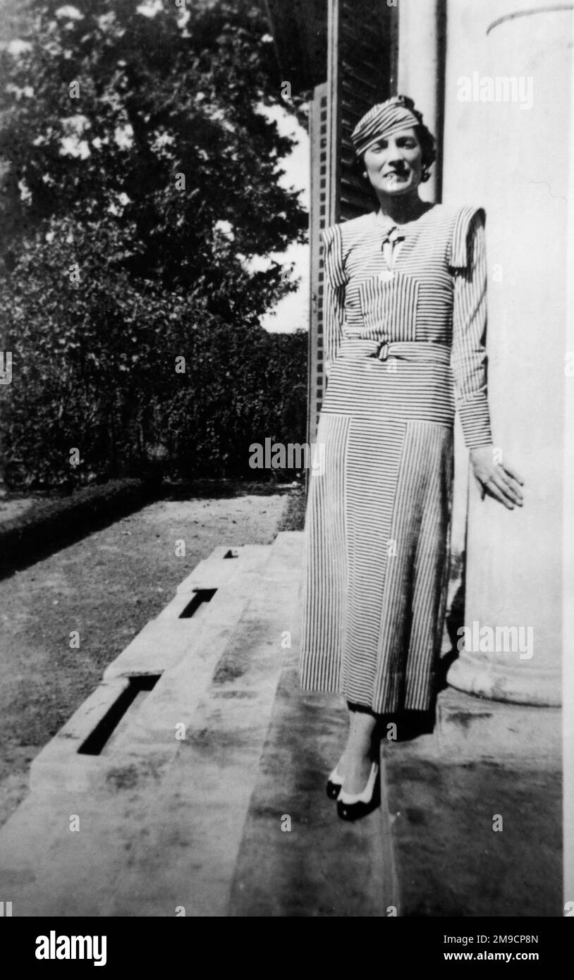 Elegant lady in stripey dress, England. Stock Photo