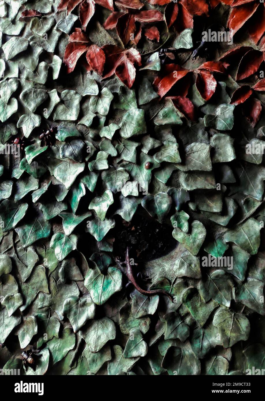 Barcelona, Spain - May 2018: The leaf-covered bronze door of the Nativity Facade in Gaudi's Sagrada Familia. Example of Gaudi's modernisme style Stock Photo