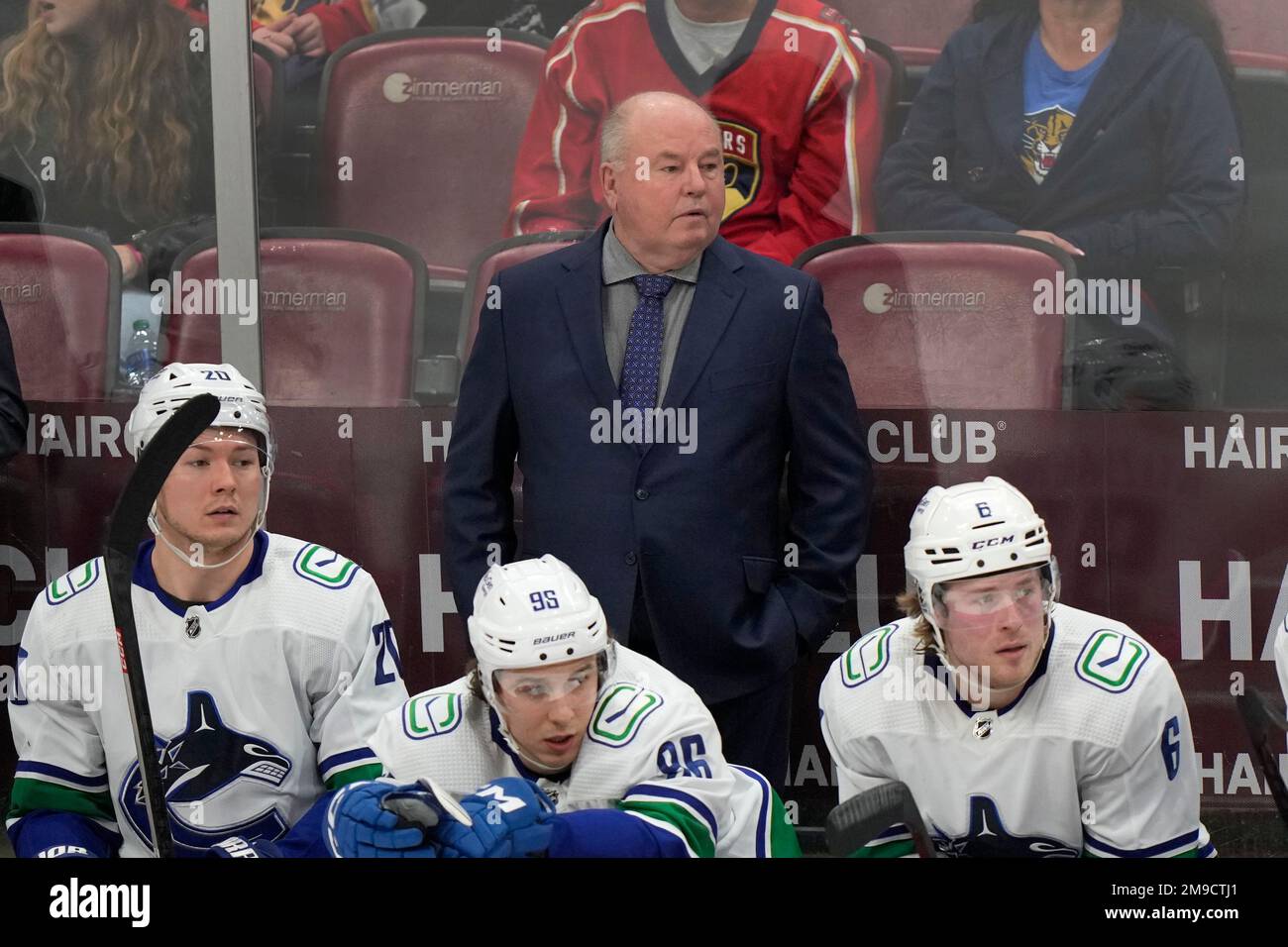 Vancouver Canucks Head Coach Bruce Boudreau, Center Rear, Looks On ...