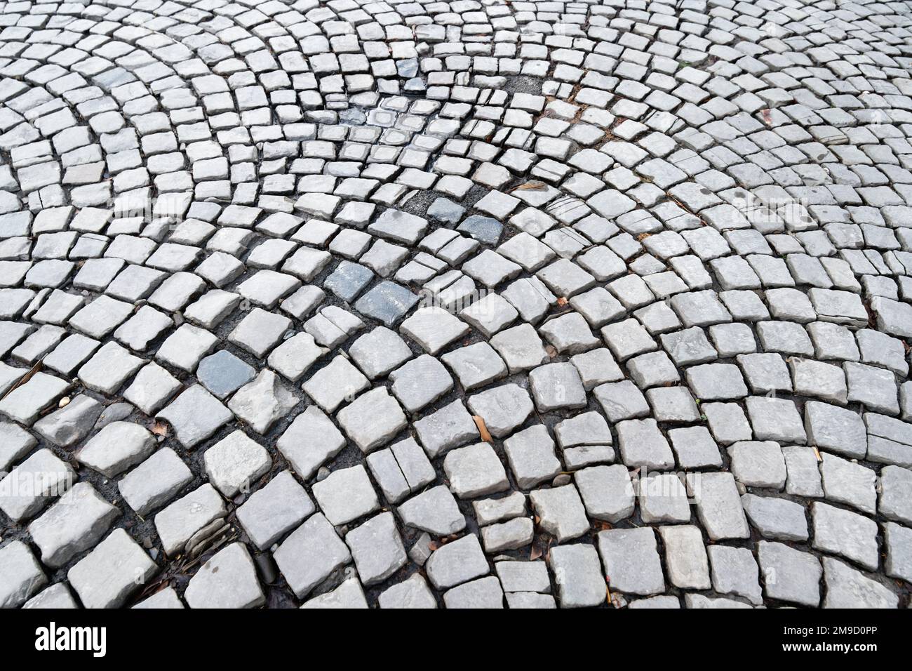 old damaged cobblestone in the old town of cologne Stock Photo