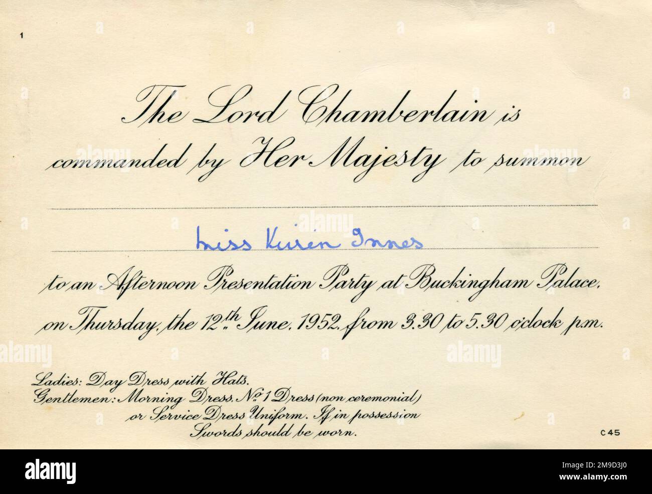 Invitation for a debutante to be presented to the Queen at Buckingham Palace on 12th June 1952.  Whereas in earlier decades, debutantes (society girls 'coming out' in society at the age of 17 or 18) were presented at evening courts, by the 1950s, presentations had become daytime events.  As per the instructions on this card, women were requested to wear day dresses. Stock Photo