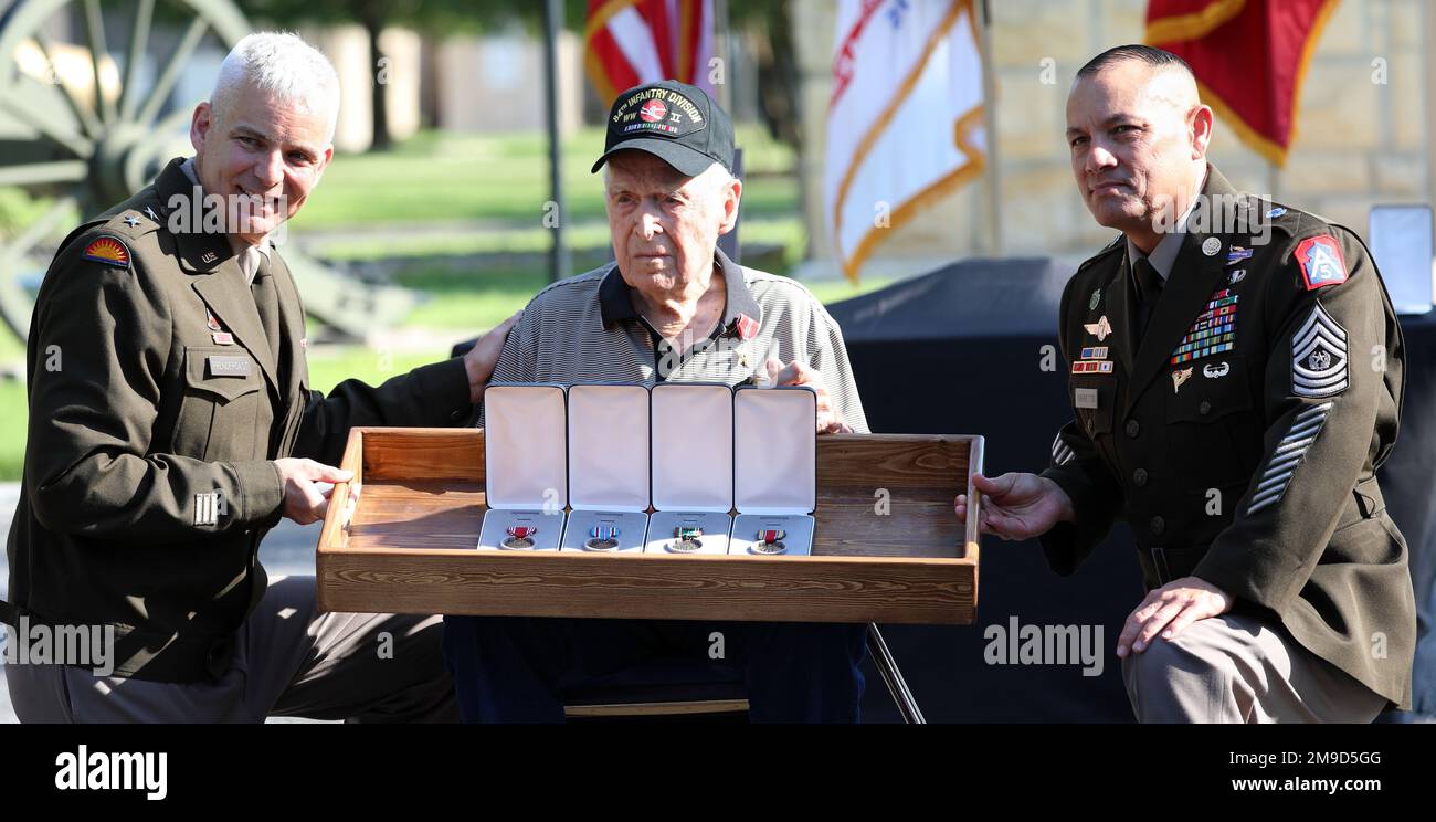 U.S. Army North leaders paid special tribute to World War II Veteran Pfc. Reid Clanton’s service awarding him long-overdue medals during a ceremony held in his honor May 16, 2022, at Joint Base San Antonio-Fort Sam Houston, Texas. Clanton enlisted in the U.S. Army at 18 years old, May 19, 1943, and his first combat assignment in a forward artillery observer team with the 29th Infantry Division landed him on Omaha Beach on D-Day. The military medals awarded to Clanton included the Bronze Star Medal. Stock Photo