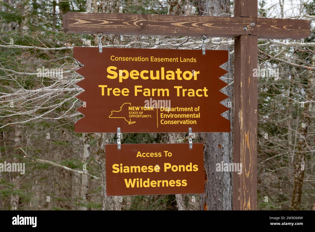A sign at the entrance to the Speculator Tree Farm Tract in the Adirondack Mountains, NY USA with access to Siamese Ponds Wilderness Stock Photo