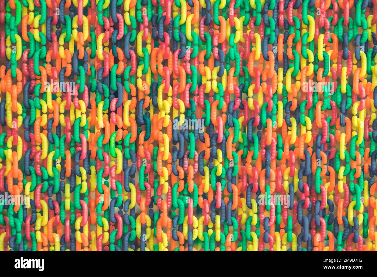 Colorful plastic chain background Stock Photo - Alamy