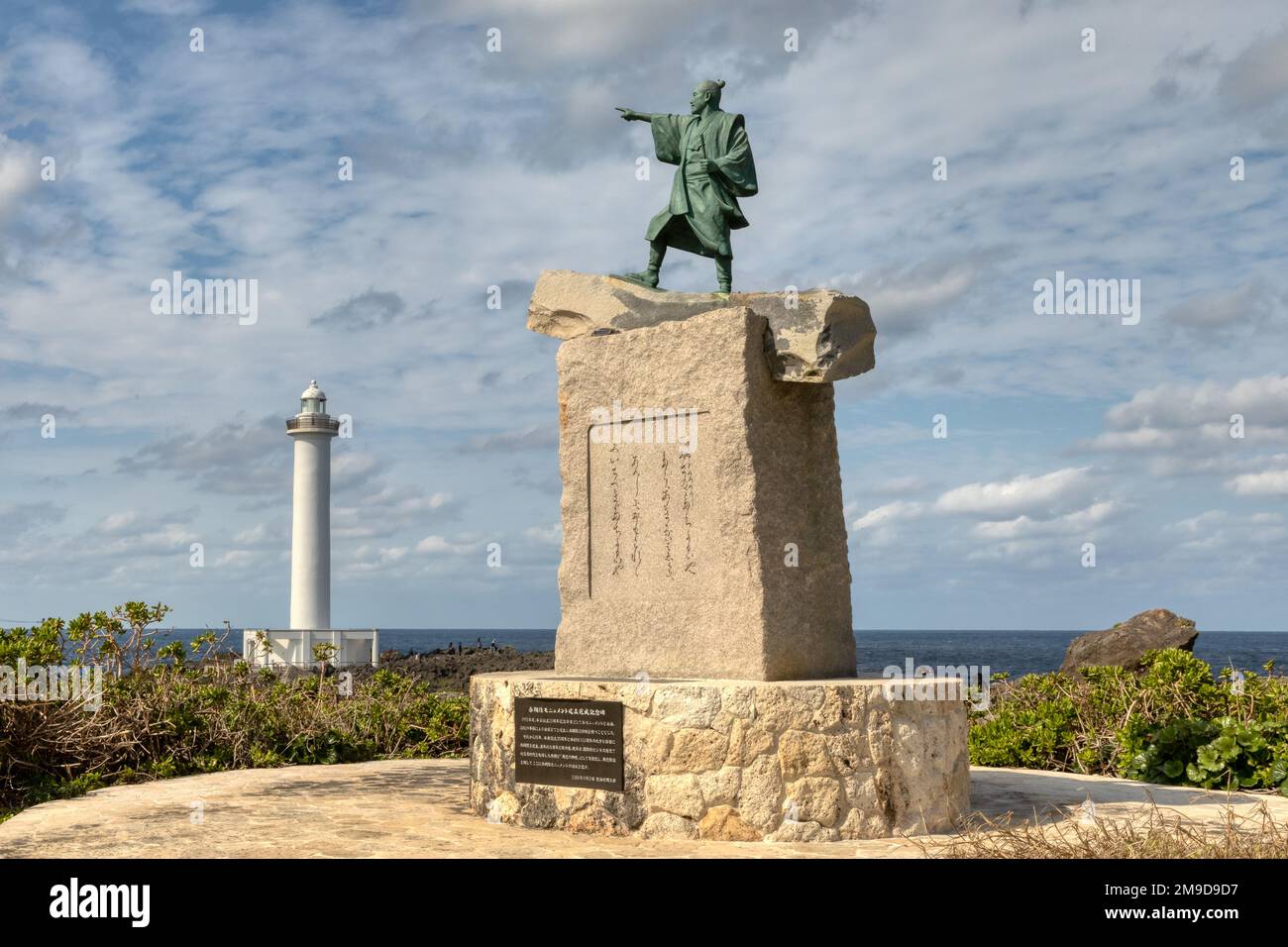 Taiki Statue pointing towards Fujian Province in China stands near Cape Zanpa Lighthouse in Okinawa, Japan Stock Photo
