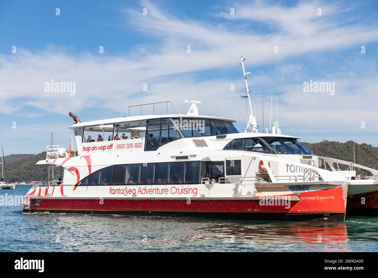 Fantasea ferry boat leaves Palm Beach wharf on Pittwater as it heads to Wagstaffe and Ettalong on the Central Coast, New South Wales,Australia Stock Photo