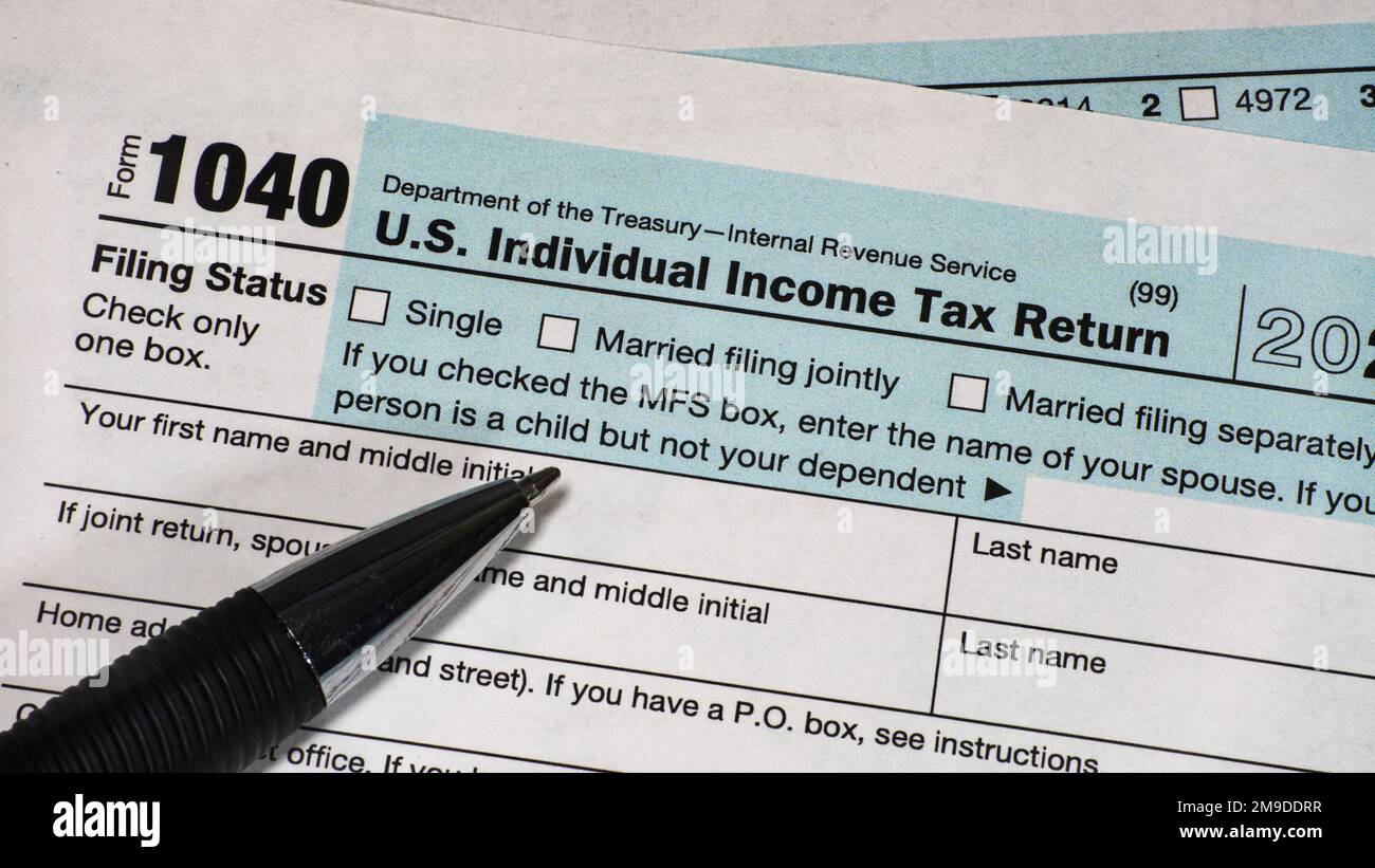 Close up of upper left corner of IRS form 1040 with focus on filing