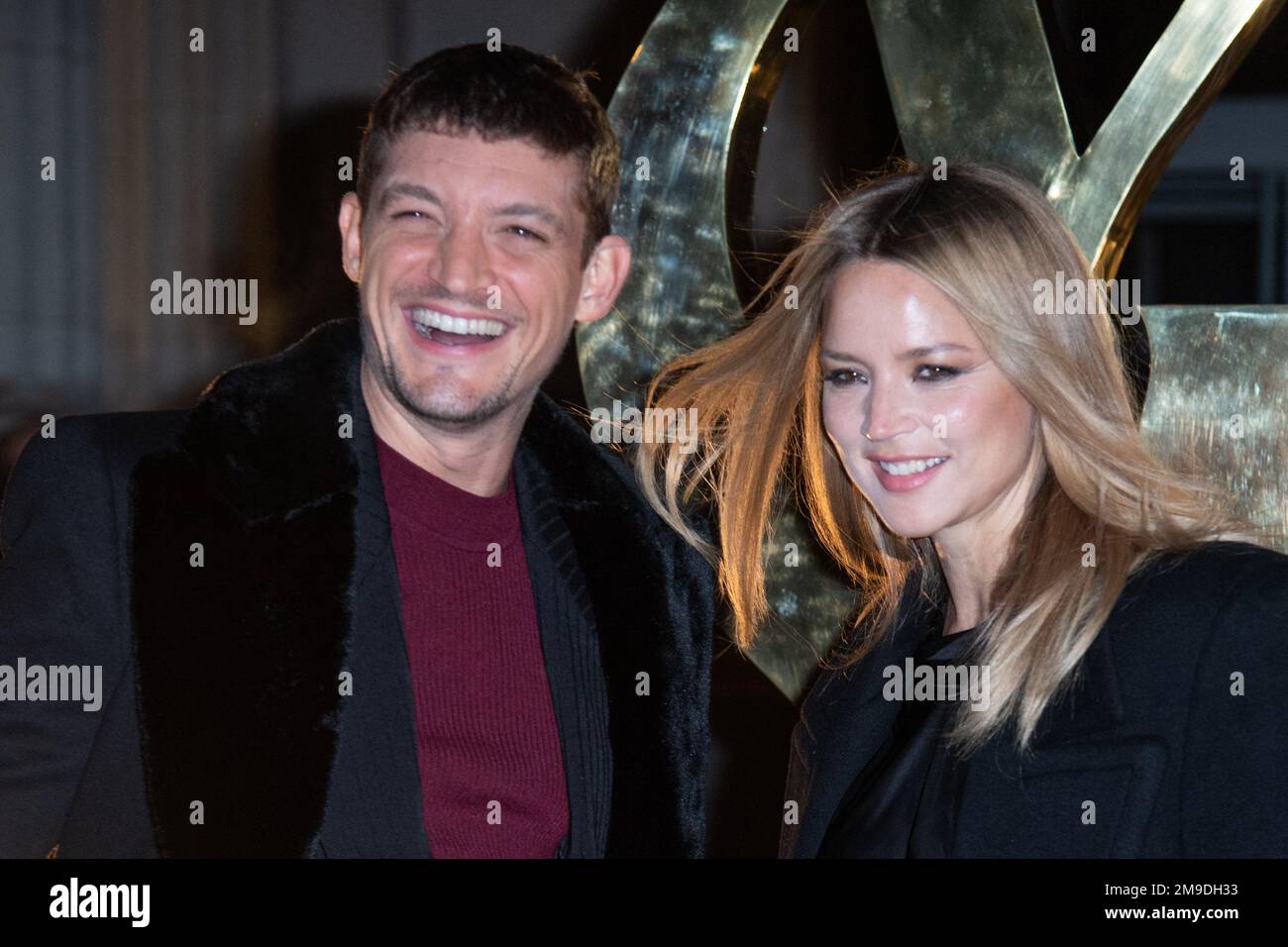 Neils Schneider and Virginie Efira attending the Saint Laurent Menswear